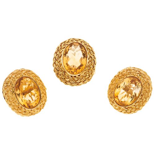 A citrine 14K yellow gold ring and pair of earrings set.