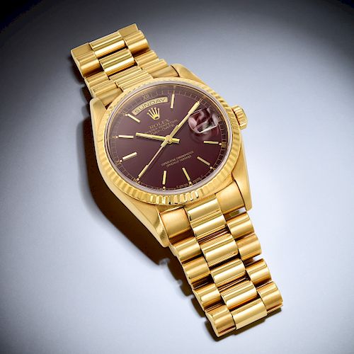 Rolex Oyster Perpetual Day Date Ref. 18238 with Oxblood Dial in 18K Gold