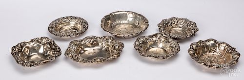 Seven Art Nouveau repoussé silver dishes