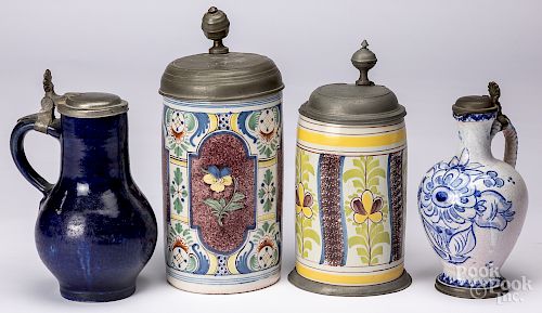 Two faience steins with pewter lids, etc.