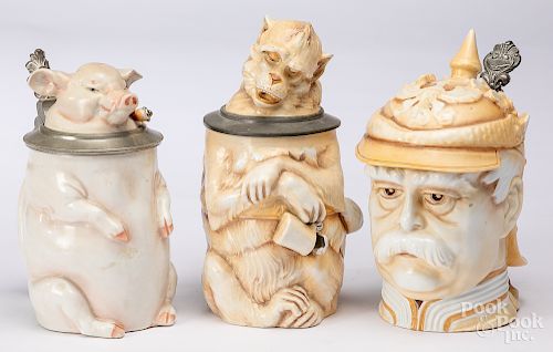 Three Musterschutz porcelain character steins