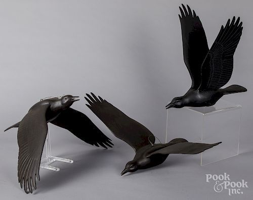 Three carved and painted flying crow decoys