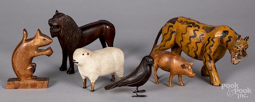 Six carved wooden animals