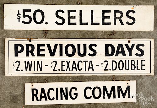Three horse racing painted wood signs
