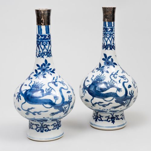 Pair of Chinese Silver-Mounted Blue and White Porcelain 'Mythical Beast' Bottle Vases