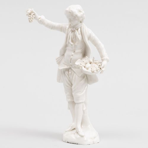 Vienna Porcelain White Figure of a Boy with Fruit Basket