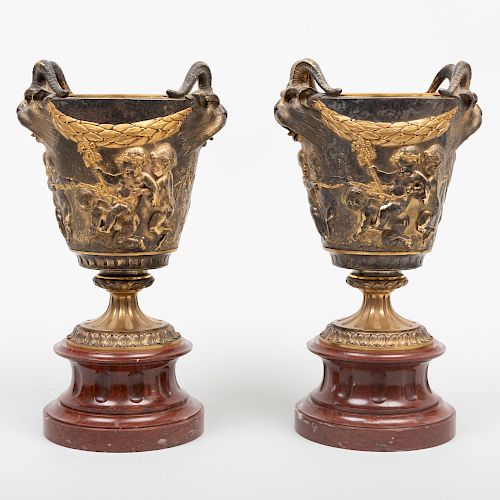 Pair of Napoleon III Gilt-Bronze Urns on Marble Socles