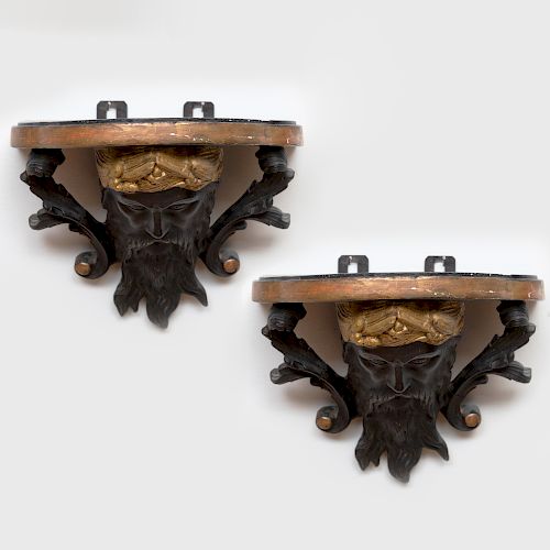Pair of Unusual Continental Ebonized and Parcel-Gilt Composition and Wood Brackets