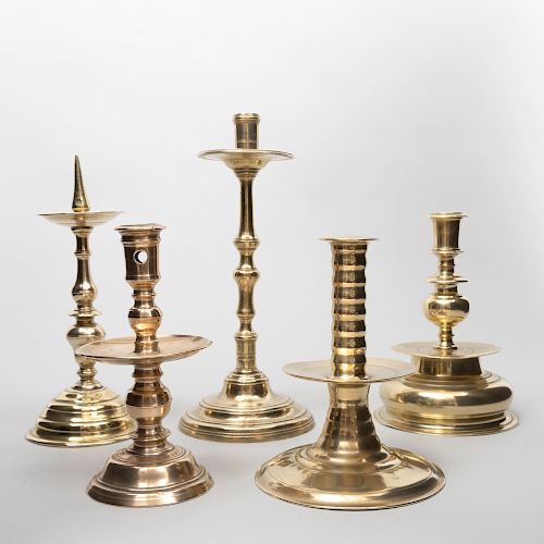 Group of Four Continental Baroque Bronze Candlesticks