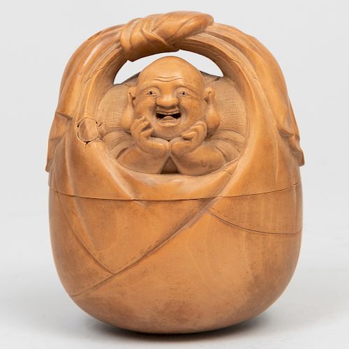 Japanese Carved Boxwood Inro in the Form of an Immortal in a Basket