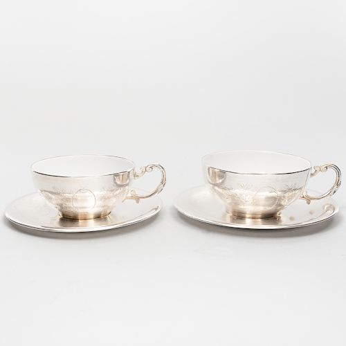 Pair of Egyptian Silver-Mounted Porcelain Teacups and Saucers