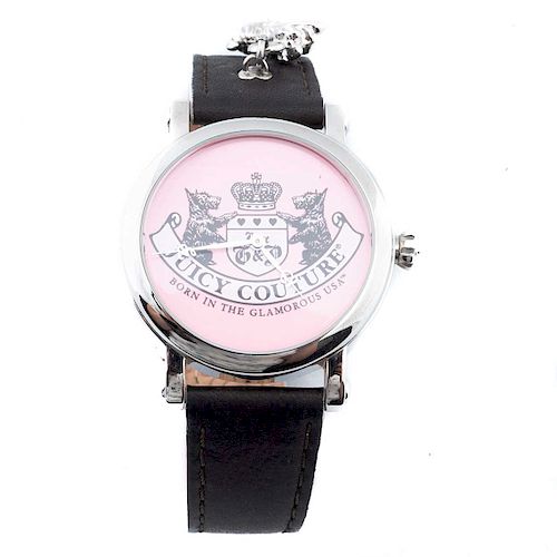 Reloj Juicy Couture. Movimiento de cuarzo. Caja circular en acero. Carátula en color rosa. Pulso piel.