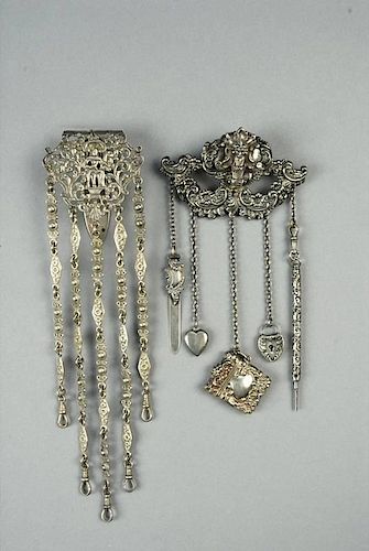 TWO VICTORIAN SILVER CHATELAINES.
