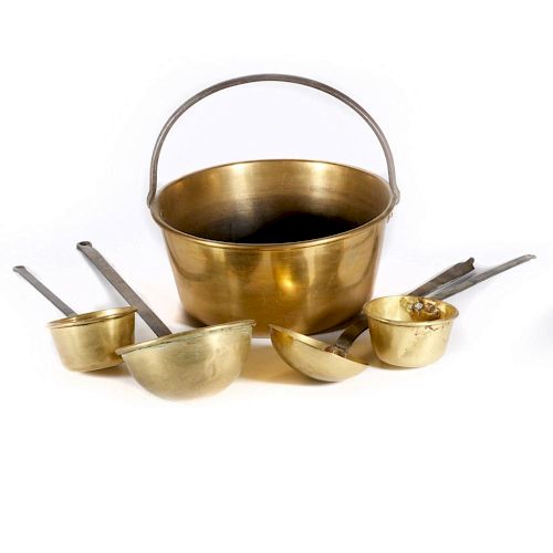 A brass fireplace pot and four ladles.
