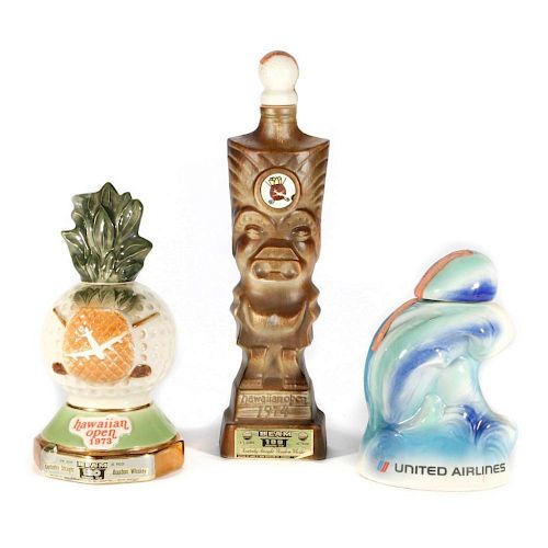 Three Jim Beam Hawaian Golf tournament commemorative bottles.