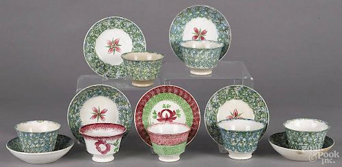 Group of spatterware cups and saucers, 19th c., to include a set of five in blue and green