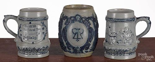 Three blue and white stoneware mugs, early 20th c., attributed to White's Utica, New York