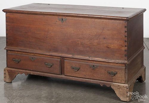 Pennsylvania Chippendale walnut blanket chest, late 18th c., having a two-drawer base