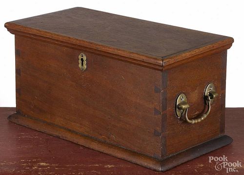 Pennsylvania walnut lock box, ca. 1800, the interior with an inset tray, 6'' h., 12'' w., 6'' d.