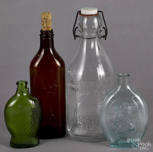 Four assorted glass bottles, 20th c., tallest - 10 1/4''.