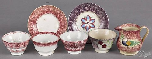 Seven pieces of spatter, 19th c., to include a cherry cup and a red peafowl creamer.