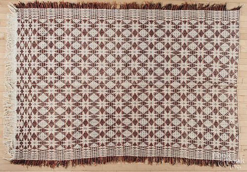 Jacquard coverlet, mid 19th c., in three colors, 66'' x 90''.