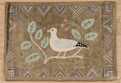 York County, Pennsylvania contemporary hooked rug, by Eredene Unger, of a dove, 33'' x 46''.