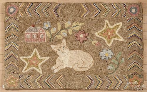York County, Pennsylvania contemporary hooked rug, by Eredene Unger, of a cat, 27'' x 43''.