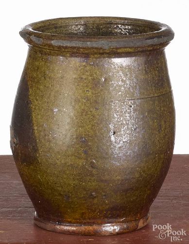 Pennsylvania redware crock, 19th c., with a green glaze, 5 3/4'' h.