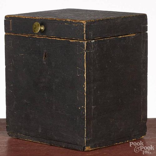 Painted pine tea caddy, 19th c., retaining an old brown surface, 6'' h.