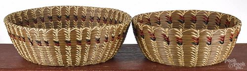 Two contemporary Native American woven baskets, 4 1/2'' h., 13 1/4'' dia. and 4'' h., 11'' dia.