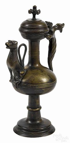 Continental Gothic-style bronze ewer, late 19th c., with a dragon handle and a lion spout, 12 3/4'' h.