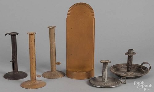 Three tin push-up candlesticks, 19th c., together with a pair of contemporary candlesticks
