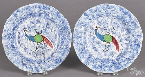 Two contemporary spatterware peafowl plates, 20th c., 9 3/4'' dia.