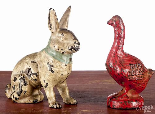 Two cast iron still banks, early 20th c., to include Red Goose Shoes, 4 1/4'' h.