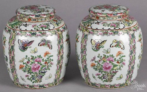 Pair of Chinese export rose medallion ginger jars, 20th c., with butterfly decoration, 10 1/4'' h.