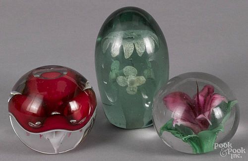 Three floral glass paperweights, largest - 4 1/2'' h.