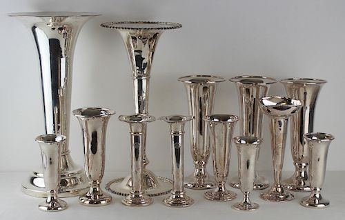 Grouping of 13 Trumpet Vases.