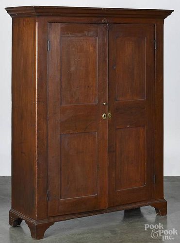 Pennsylvania cherry canning cupboard, 19th c., with a red wash, 60'' h., 46'' w., 14 1/2'' d.
