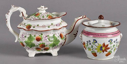 English strawberry pattern teapot, 6 1/2'' h., and a covered sugar, 19th c., 5 1/2'' h.