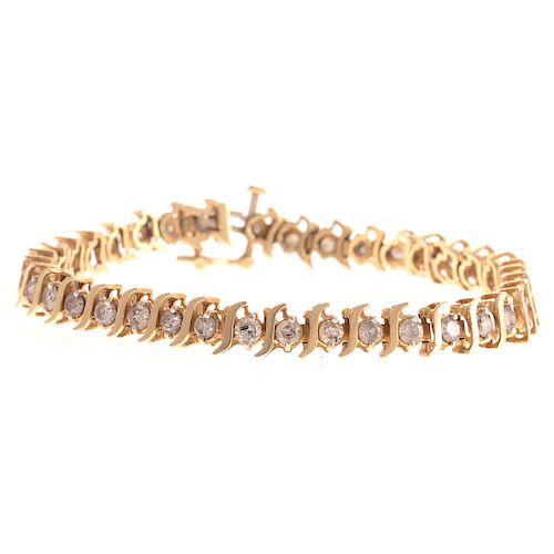 A Ladies Diamond Tennis Bracelet in 14K Gold