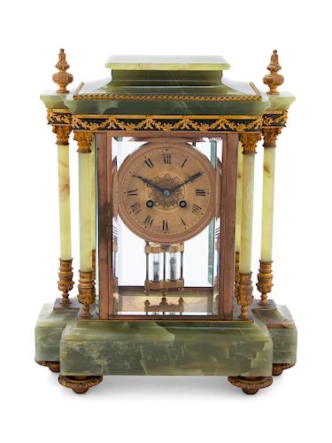 A French Gilt Bronze Mounted Onyx Mantel Clock