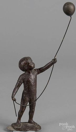 Bronze figure of a young boy with a balloon, signed B. B. Scamane 1986 1/15, 13'' h.
