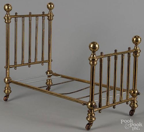 Brass doll bed, late 19th c., 20 1/2'' h., 25 1/2'' l.