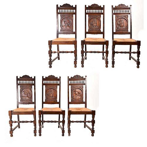 Lote de 6 sillas. Francia. Siglo XX. Estilo Bretón. En talla de madera de roble. Con respaldos semiabiertos, asientos de palma.