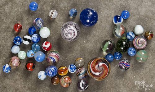 Group of miscellaneous marbles, 20th c., to include swirls, onion skins, and agates