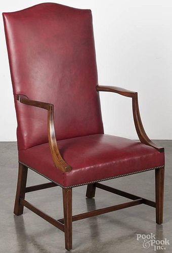 Kittinger mahogany lolling chair with line inlay.