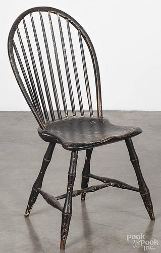 New England Windsor hoopback chair, early 19th c., retaining a black painted surface