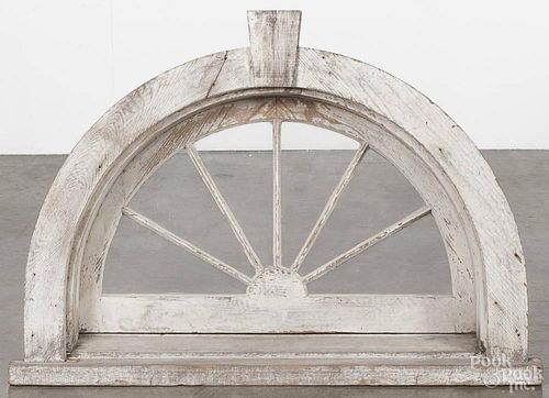 Painted pine transom window, 19th c., retaining an old white surface, 26 1/2'' h., 37 3/4'' w.