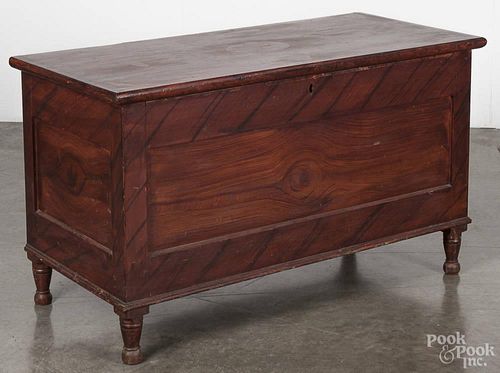 Pennsylvania painted pine blanket chest, 19th c., retaining the original red grained surface